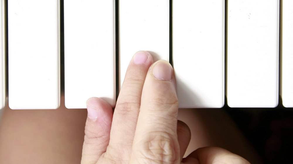 Child and adult hands on keyboard