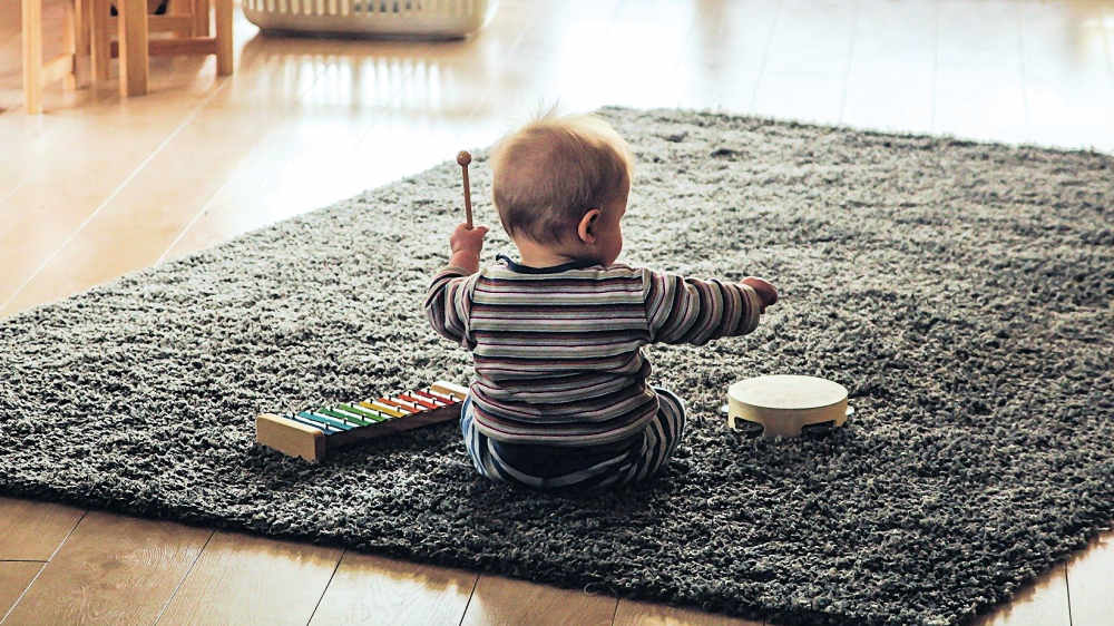 Baby with instruments